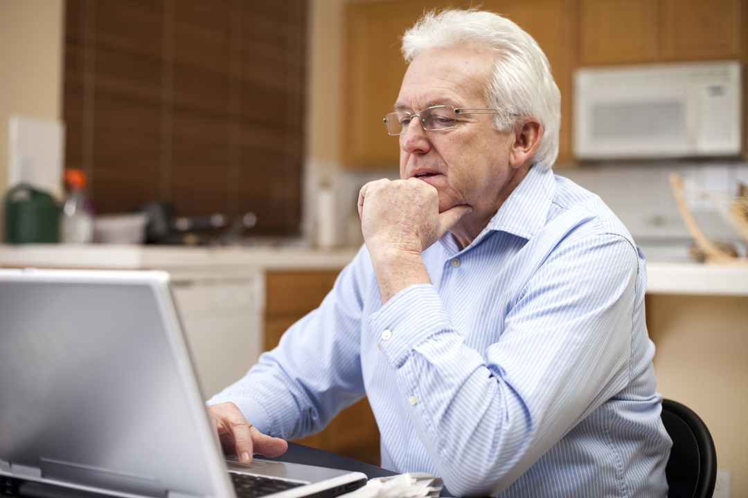 Man sitting at laptop